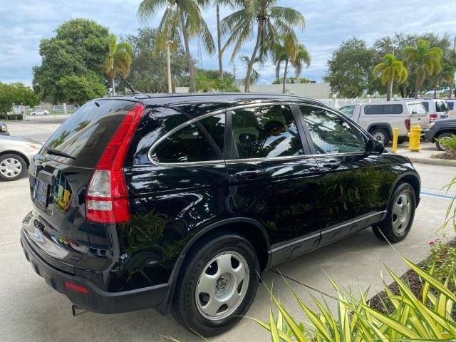 2007 Nighthawk Black Pearl /Ivory Honda CR-V LX LOW MILES 74,639 (JHLRE38377C) with an 2.4L 4-Cyl Engine engine, Automatic transmission, located at 4701 North Dixie Hwy, Pompano Beach, FL, 33064, (954) 422-2889, 26.240938, -80.123474 - OUR WEBPAGE FLORIDACARS1.COM HAS OVER 100 PHOTOS AND FREE CARFAX LINK 2007 Honda CR-V LX 4 Door Wagon/Sport Utility 2.4L I4 F DOHC 16V Gasoline 30 MPG Front Wheel Drive Features ABS Brakes Air Conditioning AM/FM Stereo Automatic Transmission Auxiliary Audio Input CD Audio Cloth Seats Cruise Control- Photo#7