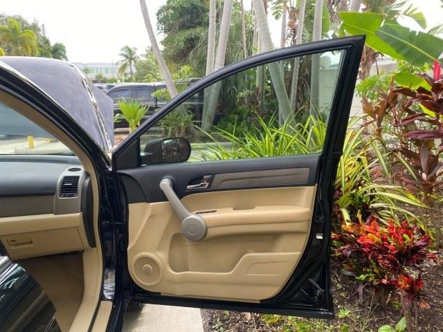 2007 Nighthawk Black Pearl /Ivory Honda CR-V LX LOW MILES 74,639 (JHLRE38377C) with an 2.4L 4-Cyl Engine engine, Automatic transmission, located at 4701 North Dixie Hwy, Pompano Beach, FL, 33064, (954) 422-2889, 26.240938, -80.123474 - OUR WEBPAGE FLORIDACARS1.COM HAS OVER 100 PHOTOS AND FREE CARFAX LINK 2007 Honda CR-V LX 4 Door Wagon/Sport Utility 2.4L I4 F DOHC 16V Gasoline 30 MPG Front Wheel Drive Features ABS Brakes Air Conditioning AM/FM Stereo Automatic Transmission Auxiliary Audio Input CD Audio Cloth Seats Cruise Control- Photo#11