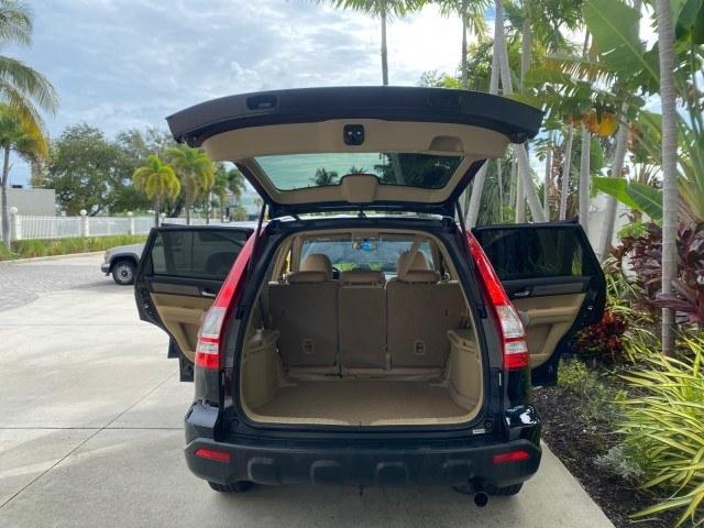 2007 Nighthawk Black Pearl /Ivory Honda CR-V LX LOW MILES 74,639 (JHLRE38377C) with an 2.4L 4-Cyl Engine engine, Automatic transmission, located at 4701 North Dixie Hwy, Pompano Beach, FL, 33064, (954) 422-2889, 26.240938, -80.123474 - OUR WEBPAGE FLORIDACARS1.COM HAS OVER 100 PHOTOS AND FREE CARFAX LINK 2007 Honda CR-V LX 4 Door Wagon/Sport Utility 2.4L I4 F DOHC 16V Gasoline 30 MPG Front Wheel Drive Features ABS Brakes Air Conditioning AM/FM Stereo Automatic Transmission Auxiliary Audio Input CD Audio Cloth Seats Cruise Control- Photo#15