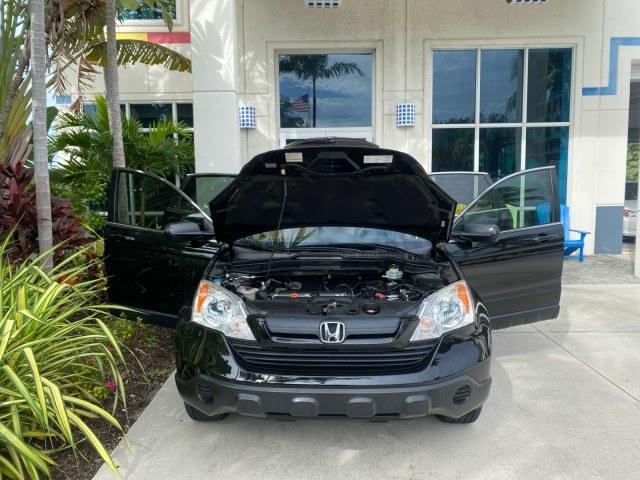 2007 Nighthawk Black Pearl /Ivory Honda CR-V LX LOW MILES 74,639 (JHLRE38377C) with an 2.4L 4-Cyl Engine engine, Automatic transmission, located at 4701 North Dixie Hwy, Pompano Beach, FL, 33064, (954) 422-2889, 26.240938, -80.123474 - OUR WEBPAGE FLORIDACARS1.COM HAS OVER 100 PHOTOS AND FREE CARFAX LINK 2007 Honda CR-V LX 4 Door Wagon/Sport Utility 2.4L I4 F DOHC 16V Gasoline 30 MPG Front Wheel Drive Features ABS Brakes Air Conditioning AM/FM Stereo Automatic Transmission Auxiliary Audio Input CD Audio Cloth Seats Cruise Control- Photo#16