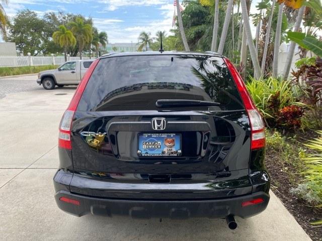 2007 Nighthawk Black Pearl /Ivory Honda CR-V LX LOW MILES 74,639 (JHLRE38377C) with an 2.4L 4-Cyl Engine engine, Automatic transmission, located at 4701 North Dixie Hwy, Pompano Beach, FL, 33064, (954) 422-2889, 26.240938, -80.123474 - OUR WEBPAGE FLORIDACARS1.COM HAS OVER 100 PHOTOS AND FREE CARFAX LINK 2007 Honda CR-V LX 4 Door Wagon/Sport Utility 2.4L I4 F DOHC 16V Gasoline 30 MPG Front Wheel Drive Features ABS Brakes Air Conditioning AM/FM Stereo Automatic Transmission Auxiliary Audio Input CD Audio Cloth Seats Cruise Control- Photo#69