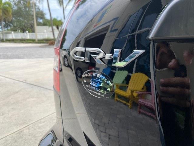 2007 Nighthawk Black Pearl /Ivory Honda CR-V LX LOW MILES 74,639 (JHLRE38377C) with an 2.4L 4-Cyl Engine engine, Automatic transmission, located at 4701 North Dixie Hwy, Pompano Beach, FL, 33064, (954) 422-2889, 26.240938, -80.123474 - OUR WEBPAGE FLORIDACARS1.COM HAS OVER 100 PHOTOS AND FREE CARFAX LINK 2007 Honda CR-V LX 4 Door Wagon/Sport Utility 2.4L I4 F DOHC 16V Gasoline 30 MPG Front Wheel Drive Features ABS Brakes Air Conditioning AM/FM Stereo Automatic Transmission Auxiliary Audio Input CD Audio Cloth Seats Cruise Control- Photo#72