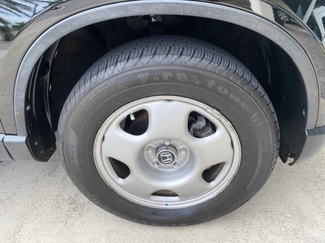 2007 Nighthawk Black Pearl /Ivory Honda CR-V LX LOW MILES 74,639 (JHLRE38377C) with an 2.4L 4-Cyl Engine engine, Automatic transmission, located at 4701 North Dixie Hwy, Pompano Beach, FL, 33064, (954) 422-2889, 26.240938, -80.123474 - OUR WEBPAGE FLORIDACARS1.COM HAS OVER 100 PHOTOS AND FREE CARFAX LINK 2007 Honda CR-V LX 4 Door Wagon/Sport Utility 2.4L I4 F DOHC 16V Gasoline 30 MPG Front Wheel Drive Features ABS Brakes Air Conditioning AM/FM Stereo Automatic Transmission Auxiliary Audio Input CD Audio Cloth Seats Cruise Control- Photo#78