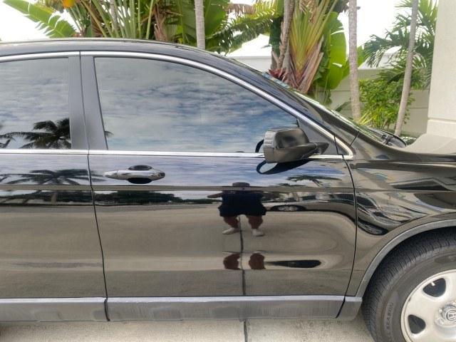 2007 Nighthawk Black Pearl /Ivory Honda CR-V LX LOW MILES 74,639 (JHLRE38377C) with an 2.4L 4-Cyl Engine engine, Automatic transmission, located at 4701 North Dixie Hwy, Pompano Beach, FL, 33064, (954) 422-2889, 26.240938, -80.123474 - OUR WEBPAGE FLORIDACARS1.COM HAS OVER 100 PHOTOS AND FREE CARFAX LINK 2007 Honda CR-V LX 4 Door Wagon/Sport Utility 2.4L I4 F DOHC 16V Gasoline 30 MPG Front Wheel Drive Features ABS Brakes Air Conditioning AM/FM Stereo Automatic Transmission Auxiliary Audio Input CD Audio Cloth Seats Cruise Control- Photo#80