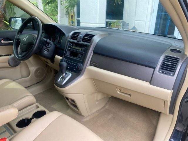 2007 Nighthawk Black Pearl /Ivory Honda CR-V LX LOW MILES 74,639 (JHLRE38377C) with an 2.4L 4-Cyl Engine engine, Automatic transmission, located at 4701 North Dixie Hwy, Pompano Beach, FL, 33064, (954) 422-2889, 26.240938, -80.123474 - OUR WEBPAGE FLORIDACARS1.COM HAS OVER 100 PHOTOS AND FREE CARFAX LINK 2007 Honda CR-V LX 4 Door Wagon/Sport Utility 2.4L I4 F DOHC 16V Gasoline 30 MPG Front Wheel Drive Features ABS Brakes Air Conditioning AM/FM Stereo Automatic Transmission Auxiliary Audio Input CD Audio Cloth Seats Cruise Control- Photo#86