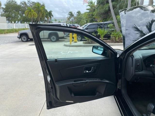 2006 Black Raven /Ebony Cadillac CTS LOW MILES 40,996 (1G6DM57T660) with an 2.8L DOHC V6 Engine engine, Automatic transmission, located at 4701 North Dixie Hwy, Pompano Beach, FL, 33064, (954) 422-2889, 26.240938, -80.123474 - OUR WEBPAGE FLORIDACARS1.COM HAS OVER 100 PHOTOS AND FREE CARFAX LINK 2006 Cadillac CTS Sedan 4 DR 2.8L V6 F Gasoline 27 MPG Rear Wheel Drive Features ABS Brakes Air Conditioning Alloy Wheels AM/FM Stereo Automatic Transmission CD Audio Cruise Control Leatherette Seats Overhead Airbags Power Locks P- Photo#9