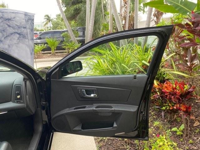 2006 Black Raven /Ebony Cadillac CTS LOW MILES 40,996 (1G6DM57T660) with an 2.8L DOHC V6 Engine engine, Automatic transmission, located at 4701 North Dixie Hwy, Pompano Beach, FL, 33064, (954) 422-2889, 26.240938, -80.123474 - OUR WEBPAGE FLORIDACARS1.COM HAS OVER 100 PHOTOS AND FREE CARFAX LINK 2006 Cadillac CTS Sedan 4 DR 2.8L V6 F Gasoline 27 MPG Rear Wheel Drive Features ABS Brakes Air Conditioning Alloy Wheels AM/FM Stereo Automatic Transmission CD Audio Cruise Control Leatherette Seats Overhead Airbags Power Locks P- Photo#11