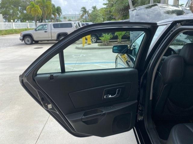2006 Black Raven /Ebony Cadillac CTS LOW MILES 40,996 (1G6DM57T660) with an 2.8L DOHC V6 Engine engine, Automatic transmission, located at 4701 North Dixie Hwy, Pompano Beach, FL, 33064, (954) 422-2889, 26.240938, -80.123474 - OUR WEBPAGE FLORIDACARS1.COM HAS OVER 100 PHOTOS AND FREE CARFAX LINK 2006 Cadillac CTS Sedan 4 DR 2.8L V6 F Gasoline 27 MPG Rear Wheel Drive Features ABS Brakes Air Conditioning Alloy Wheels AM/FM Stereo Automatic Transmission CD Audio Cruise Control Leatherette Seats Overhead Airbags Power Locks P- Photo#13