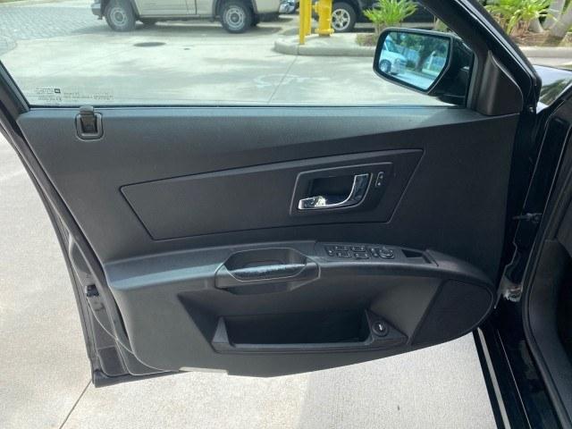2006 Black Raven /Ebony Cadillac CTS LOW MILES 40,996 (1G6DM57T660) with an 2.8L DOHC V6 Engine engine, Automatic transmission, located at 4701 North Dixie Hwy, Pompano Beach, FL, 33064, (954) 422-2889, 26.240938, -80.123474 - OUR WEBPAGE FLORIDACARS1.COM HAS OVER 100 PHOTOS AND FREE CARFAX LINK 2006 Cadillac CTS Sedan 4 DR 2.8L V6 F Gasoline 27 MPG Rear Wheel Drive Features ABS Brakes Air Conditioning Alloy Wheels AM/FM Stereo Automatic Transmission CD Audio Cruise Control Leatherette Seats Overhead Airbags Power Locks P- Photo#31
