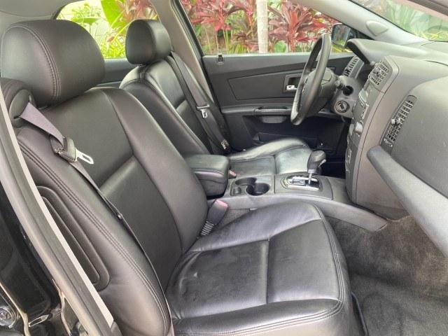 2006 Black Raven /Ebony Cadillac CTS LOW MILES 40,996 (1G6DM57T660) with an 2.8L DOHC V6 Engine engine, Automatic transmission, located at 4701 North Dixie Hwy, Pompano Beach, FL, 33064, (954) 422-2889, 26.240938, -80.123474 - OUR WEBPAGE FLORIDACARS1.COM HAS OVER 100 PHOTOS AND FREE CARFAX LINK 2006 Cadillac CTS Sedan 4 DR 2.8L V6 F Gasoline 27 MPG Rear Wheel Drive Features ABS Brakes Air Conditioning Alloy Wheels AM/FM Stereo Automatic Transmission CD Audio Cruise Control Leatherette Seats Overhead Airbags Power Locks P- Photo#75