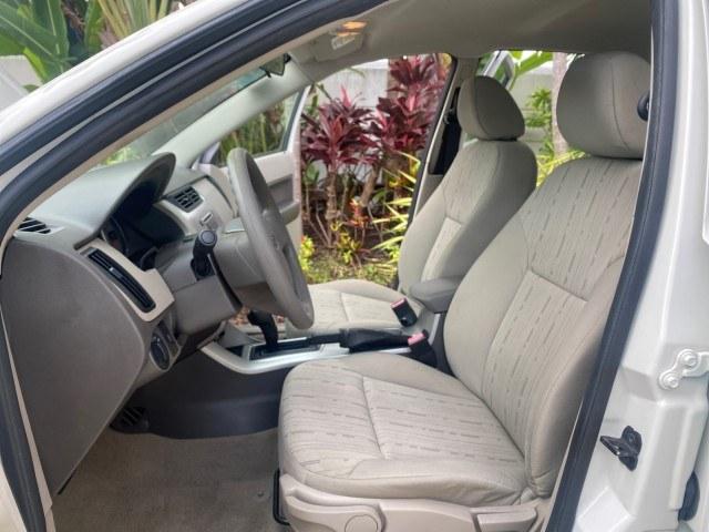 2011 White Suede /Medium Stone Ford Focus SE LOW MILES 36,864 (1FAHP3FN6BW) with an 2.0L 4-Cyl Engine engine, Automatic transmission, located at 4701 North Dixie Hwy, Pompano Beach, FL, 33064, (954) 422-2889, 26.240938, -80.123474 - OUR WEBPAGE FLORIDACARS1.COM HAS OVER 100 PHOTOS AND FREE CARFAX LINK 2011 Ford Focus SE Sedan 4 DR 2.0L I4 F DOHC 16V Gasoline 35 MPG Front Wheel Drive Features ABS Brakes Air Conditioning Alloy Wheels AM/FM Stereo Automatic Transmission Auxiliary Audio Input CD Audio Cloth Seats Cruise Control Ove- Photo#10