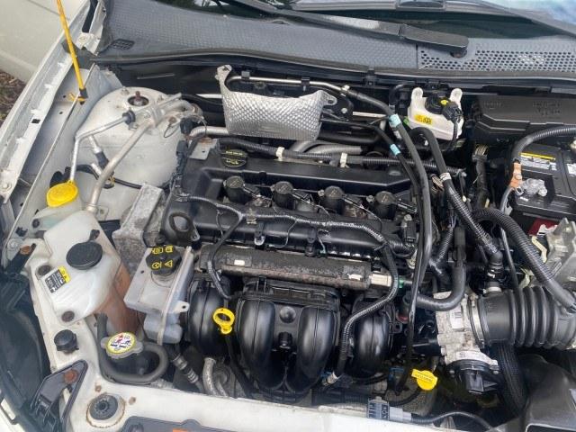 2011 White Suede /Medium Stone Ford Focus SE LOW MILES 36,864 (1FAHP3FN6BW) with an 2.0L 4-Cyl Engine engine, Automatic transmission, located at 4701 North Dixie Hwy, Pompano Beach, FL, 33064, (954) 422-2889, 26.240938, -80.123474 - OUR WEBPAGE FLORIDACARS1.COM HAS OVER 100 PHOTOS AND FREE CARFAX LINK 2011 Ford Focus SE Sedan 4 DR 2.0L I4 F DOHC 16V Gasoline 35 MPG Front Wheel Drive Features ABS Brakes Air Conditioning Alloy Wheels AM/FM Stereo Automatic Transmission Auxiliary Audio Input CD Audio Cloth Seats Cruise Control Ove- Photo#24