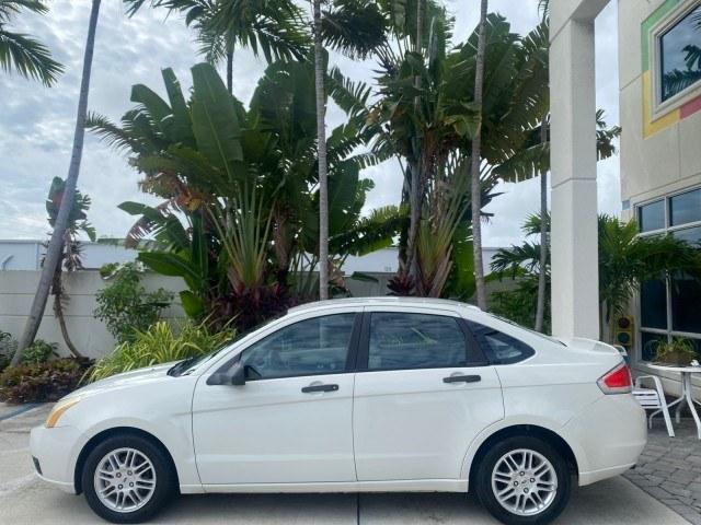 2011 White Suede /Medium Stone Ford Focus SE LOW MILES 36,864 (1FAHP3FN6BW) with an 2.0L 4-Cyl Engine engine, Automatic transmission, located at 4701 North Dixie Hwy, Pompano Beach, FL, 33064, (954) 422-2889, 26.240938, -80.123474 - OUR WEBPAGE FLORIDACARS1.COM HAS OVER 100 PHOTOS AND FREE CARFAX LINK 2011 Ford Focus SE Sedan 4 DR 2.0L I4 F DOHC 16V Gasoline 35 MPG Front Wheel Drive Features ABS Brakes Air Conditioning Alloy Wheels AM/FM Stereo Automatic Transmission Auxiliary Audio Input CD Audio Cloth Seats Cruise Control Ove- Photo#31