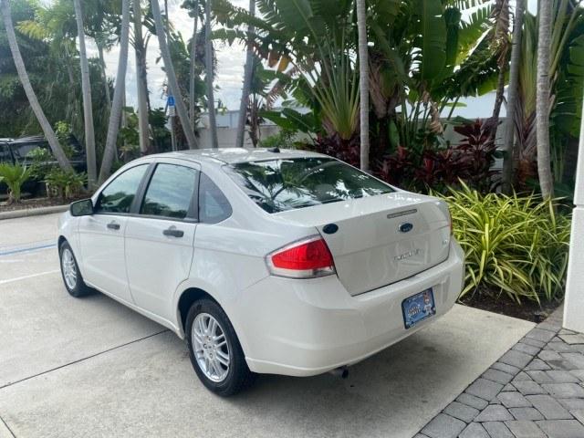 2011 White Suede /Medium Stone Ford Focus SE LOW MILES 36,864 (1FAHP3FN6BW) with an 2.0L 4-Cyl Engine engine, Automatic transmission, located at 4701 North Dixie Hwy, Pompano Beach, FL, 33064, (954) 422-2889, 26.240938, -80.123474 - OUR WEBPAGE FLORIDACARS1.COM HAS OVER 100 PHOTOS AND FREE CARFAX LINK 2011 Ford Focus SE Sedan 4 DR 2.0L I4 F DOHC 16V Gasoline 35 MPG Front Wheel Drive Features ABS Brakes Air Conditioning Alloy Wheels AM/FM Stereo Automatic Transmission Auxiliary Audio Input CD Audio Cloth Seats Cruise Control Ove- Photo#32