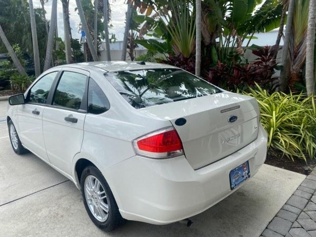 2011 White Suede /Medium Stone Ford Focus SE LOW MILES 36,864 (1FAHP3FN6BW) with an 2.0L 4-Cyl Engine engine, Automatic transmission, located at 4701 North Dixie Hwy, Pompano Beach, FL, 33064, (954) 422-2889, 26.240938, -80.123474 - OUR WEBPAGE FLORIDACARS1.COM HAS OVER 100 PHOTOS AND FREE CARFAX LINK 2011 Ford Focus SE Sedan 4 DR 2.0L I4 F DOHC 16V Gasoline 35 MPG Front Wheel Drive Features ABS Brakes Air Conditioning Alloy Wheels AM/FM Stereo Automatic Transmission Auxiliary Audio Input CD Audio Cloth Seats Cruise Control Ove- Photo#33