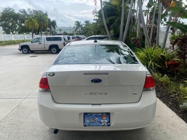 2011 White Suede /Medium Stone Ford Focus SE LOW MILES 36,864 (1FAHP3FN6BW) with an 2.0L 4-Cyl Engine engine, Automatic transmission, located at 4701 North Dixie Hwy, Pompano Beach, FL, 33064, (954) 422-2889, 26.240938, -80.123474 - OUR WEBPAGE FLORIDACARS1.COM HAS OVER 100 PHOTOS AND FREE CARFAX LINK 2011 Ford Focus SE Sedan 4 DR 2.0L I4 F DOHC 16V Gasoline 35 MPG Front Wheel Drive Features ABS Brakes Air Conditioning Alloy Wheels AM/FM Stereo Automatic Transmission Auxiliary Audio Input CD Audio Cloth Seats Cruise Control Ove- Photo#35