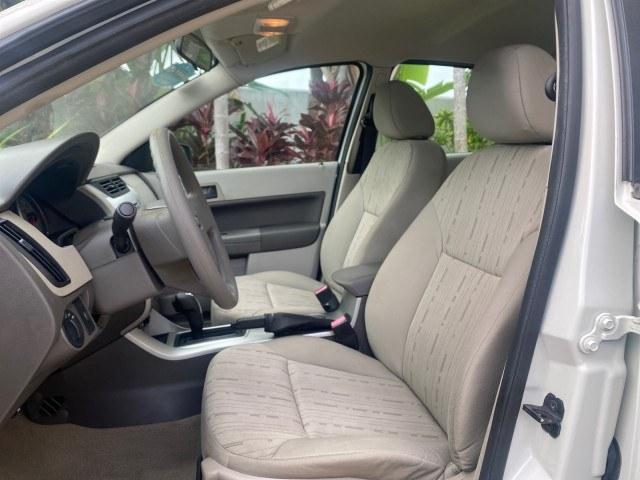 2011 White Suede /Medium Stone Ford Focus SE LOW MILES 36,864 (1FAHP3FN6BW) with an 2.0L 4-Cyl Engine engine, Automatic transmission, located at 4701 North Dixie Hwy, Pompano Beach, FL, 33064, (954) 422-2889, 26.240938, -80.123474 - OUR WEBPAGE FLORIDACARS1.COM HAS OVER 100 PHOTOS AND FREE CARFAX LINK 2011 Ford Focus SE Sedan 4 DR 2.0L I4 F DOHC 16V Gasoline 35 MPG Front Wheel Drive Features ABS Brakes Air Conditioning Alloy Wheels AM/FM Stereo Automatic Transmission Auxiliary Audio Input CD Audio Cloth Seats Cruise Control Ove- Photo#41