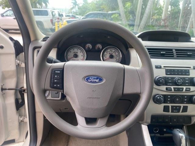 2011 White Suede /Medium Stone Ford Focus SE LOW MILES 36,864 (1FAHP3FN6BW) with an 2.0L 4-Cyl Engine engine, Automatic transmission, located at 4701 North Dixie Hwy, Pompano Beach, FL, 33064, (954) 422-2889, 26.240938, -80.123474 - OUR WEBPAGE FLORIDACARS1.COM HAS OVER 100 PHOTOS AND FREE CARFAX LINK 2011 Ford Focus SE Sedan 4 DR 2.0L I4 F DOHC 16V Gasoline 35 MPG Front Wheel Drive Features ABS Brakes Air Conditioning Alloy Wheels AM/FM Stereo Automatic Transmission Auxiliary Audio Input CD Audio Cloth Seats Cruise Control Ove- Photo#44