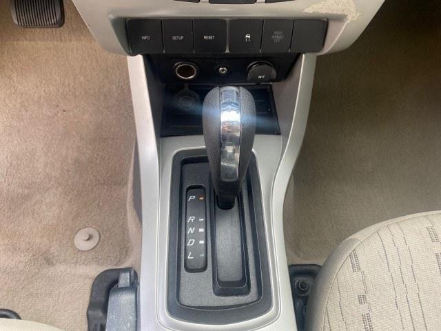 2011 White Suede /Medium Stone Ford Focus SE LOW MILES 36,864 (1FAHP3FN6BW) with an 2.0L 4-Cyl Engine engine, Automatic transmission, located at 4701 North Dixie Hwy, Pompano Beach, FL, 33064, (954) 422-2889, 26.240938, -80.123474 - OUR WEBPAGE FLORIDACARS1.COM HAS OVER 100 PHOTOS AND FREE CARFAX LINK 2011 Ford Focus SE Sedan 4 DR 2.0L I4 F DOHC 16V Gasoline 35 MPG Front Wheel Drive Features ABS Brakes Air Conditioning Alloy Wheels AM/FM Stereo Automatic Transmission Auxiliary Audio Input CD Audio Cloth Seats Cruise Control Ove- Photo#52