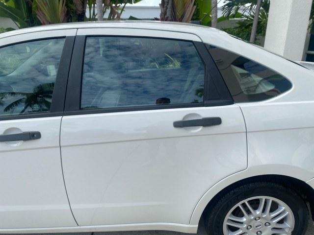 2011 White Suede /Medium Stone Ford Focus SE LOW MILES 36,864 (1FAHP3FN6BW) with an 2.0L 4-Cyl Engine engine, Automatic transmission, located at 4701 North Dixie Hwy, Pompano Beach, FL, 33064, (954) 422-2889, 26.240938, -80.123474 - OUR WEBPAGE FLORIDACARS1.COM HAS OVER 100 PHOTOS AND FREE CARFAX LINK 2011 Ford Focus SE Sedan 4 DR 2.0L I4 F DOHC 16V Gasoline 35 MPG Front Wheel Drive Features ABS Brakes Air Conditioning Alloy Wheels AM/FM Stereo Automatic Transmission Auxiliary Audio Input CD Audio Cloth Seats Cruise Control Ove- Photo#58