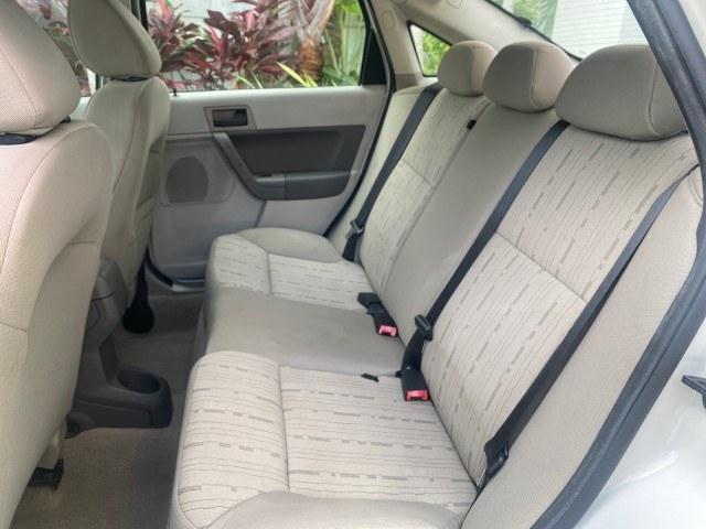 2011 White Suede /Medium Stone Ford Focus SE LOW MILES 36,864 (1FAHP3FN6BW) with an 2.0L 4-Cyl Engine engine, Automatic transmission, located at 4701 North Dixie Hwy, Pompano Beach, FL, 33064, (954) 422-2889, 26.240938, -80.123474 - OUR WEBPAGE FLORIDACARS1.COM HAS OVER 100 PHOTOS AND FREE CARFAX LINK 2011 Ford Focus SE Sedan 4 DR 2.0L I4 F DOHC 16V Gasoline 35 MPG Front Wheel Drive Features ABS Brakes Air Conditioning Alloy Wheels AM/FM Stereo Automatic Transmission Auxiliary Audio Input CD Audio Cloth Seats Cruise Control Ove- Photo#64