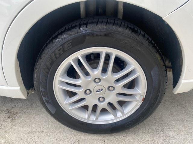 2011 White Suede /Medium Stone Ford Focus SE LOW MILES 36,864 (1FAHP3FN6BW) with an 2.0L 4-Cyl Engine engine, Automatic transmission, located at 4701 North Dixie Hwy, Pompano Beach, FL, 33064, (954) 422-2889, 26.240938, -80.123474 - OUR WEBPAGE FLORIDACARS1.COM HAS OVER 100 PHOTOS AND FREE CARFAX LINK 2011 Ford Focus SE Sedan 4 DR 2.0L I4 F DOHC 16V Gasoline 35 MPG Front Wheel Drive Features ABS Brakes Air Conditioning Alloy Wheels AM/FM Stereo Automatic Transmission Auxiliary Audio Input CD Audio Cloth Seats Cruise Control Ove- Photo#65