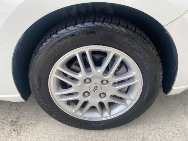 2011 White Suede /Medium Stone Ford Focus SE LOW MILES 36,864 (1FAHP3FN6BW) with an 2.0L 4-Cyl Engine engine, Automatic transmission, located at 4701 North Dixie Hwy, Pompano Beach, FL, 33064, (954) 422-2889, 26.240938, -80.123474 - OUR WEBPAGE FLORIDACARS1.COM HAS OVER 100 PHOTOS AND FREE CARFAX LINK 2011 Ford Focus SE Sedan 4 DR 2.0L I4 F DOHC 16V Gasoline 35 MPG Front Wheel Drive Features ABS Brakes Air Conditioning Alloy Wheels AM/FM Stereo Automatic Transmission Auxiliary Audio Input CD Audio Cloth Seats Cruise Control Ove- Photo#73