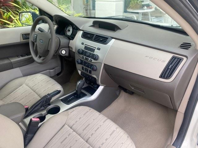 2011 White Suede /Medium Stone Ford Focus SE LOW MILES 36,864 (1FAHP3FN6BW) with an 2.0L 4-Cyl Engine engine, Automatic transmission, located at 4701 North Dixie Hwy, Pompano Beach, FL, 33064, (954) 422-2889, 26.240938, -80.123474 - OUR WEBPAGE FLORIDACARS1.COM HAS OVER 100 PHOTOS AND FREE CARFAX LINK 2011 Ford Focus SE Sedan 4 DR 2.0L I4 F DOHC 16V Gasoline 35 MPG Front Wheel Drive Features ABS Brakes Air Conditioning Alloy Wheels AM/FM Stereo Automatic Transmission Auxiliary Audio Input CD Audio Cloth Seats Cruise Control Ove- Photo#81