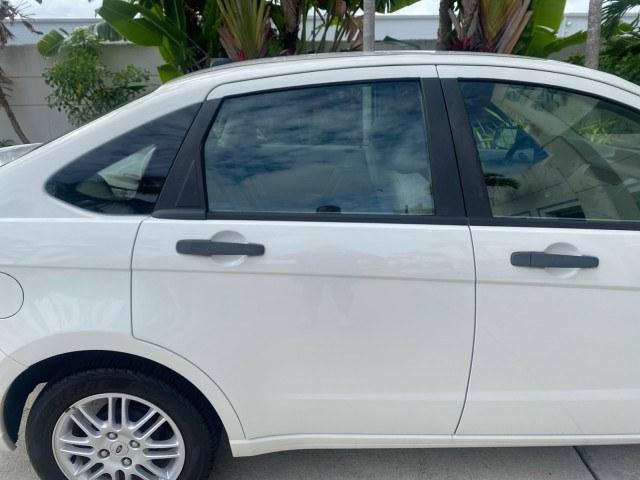 2011 White Suede /Medium Stone Ford Focus SE LOW MILES 36,864 (1FAHP3FN6BW) with an 2.0L 4-Cyl Engine engine, Automatic transmission, located at 4701 North Dixie Hwy, Pompano Beach, FL, 33064, (954) 422-2889, 26.240938, -80.123474 - OUR WEBPAGE FLORIDACARS1.COM HAS OVER 100 PHOTOS AND FREE CARFAX LINK 2011 Ford Focus SE Sedan 4 DR 2.0L I4 F DOHC 16V Gasoline 35 MPG Front Wheel Drive Features ABS Brakes Air Conditioning Alloy Wheels AM/FM Stereo Automatic Transmission Auxiliary Audio Input CD Audio Cloth Seats Cruise Control Ove- Photo#84