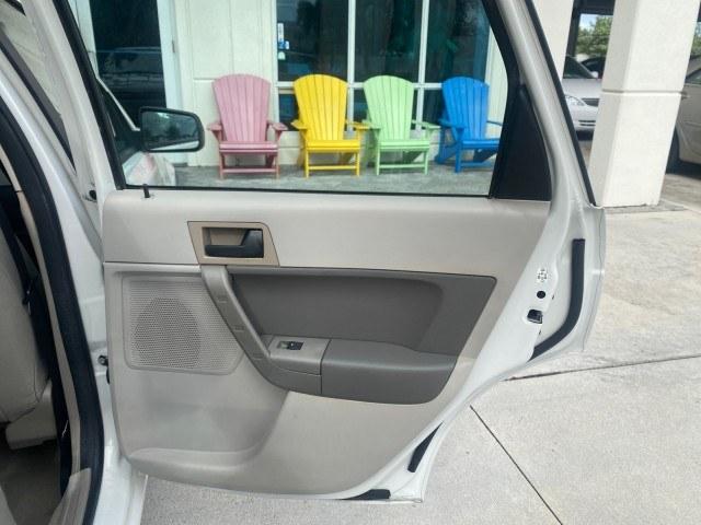 2011 White Suede /Medium Stone Ford Focus SE LOW MILES 36,864 (1FAHP3FN6BW) with an 2.0L 4-Cyl Engine engine, Automatic transmission, located at 4701 North Dixie Hwy, Pompano Beach, FL, 33064, (954) 422-2889, 26.240938, -80.123474 - OUR WEBPAGE FLORIDACARS1.COM HAS OVER 100 PHOTOS AND FREE CARFAX LINK 2011 Ford Focus SE Sedan 4 DR 2.0L I4 F DOHC 16V Gasoline 35 MPG Front Wheel Drive Features ABS Brakes Air Conditioning Alloy Wheels AM/FM Stereo Automatic Transmission Auxiliary Audio Input CD Audio Cloth Seats Cruise Control Ove- Photo#86