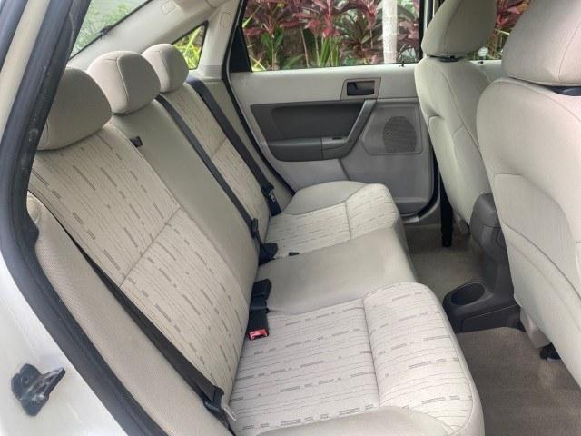 2011 White Suede /Medium Stone Ford Focus SE LOW MILES 36,864 (1FAHP3FN6BW) with an 2.0L 4-Cyl Engine engine, Automatic transmission, located at 4701 North Dixie Hwy, Pompano Beach, FL, 33064, (954) 422-2889, 26.240938, -80.123474 - OUR WEBPAGE FLORIDACARS1.COM HAS OVER 100 PHOTOS AND FREE CARFAX LINK 2011 Ford Focus SE Sedan 4 DR 2.0L I4 F DOHC 16V Gasoline 35 MPG Front Wheel Drive Features ABS Brakes Air Conditioning Alloy Wheels AM/FM Stereo Automatic Transmission Auxiliary Audio Input CD Audio Cloth Seats Cruise Control Ove- Photo#87