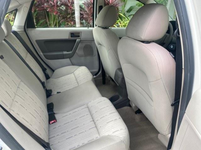2011 White Suede /Medium Stone Ford Focus SE LOW MILES 36,864 (1FAHP3FN6BW) with an 2.0L 4-Cyl Engine engine, Automatic transmission, located at 4701 North Dixie Hwy, Pompano Beach, FL, 33064, (954) 422-2889, 26.240938, -80.123474 - OUR WEBPAGE FLORIDACARS1.COM HAS OVER 100 PHOTOS AND FREE CARFAX LINK 2011 Ford Focus SE Sedan 4 DR 2.0L I4 F DOHC 16V Gasoline 35 MPG Front Wheel Drive Features ABS Brakes Air Conditioning Alloy Wheels AM/FM Stereo Automatic Transmission Auxiliary Audio Input CD Audio Cloth Seats Cruise Control Ove- Photo#88
