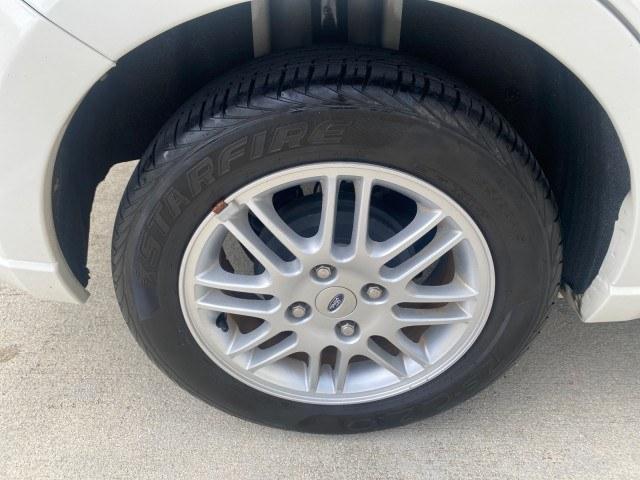 2011 White Suede /Medium Stone Ford Focus SE LOW MILES 36,864 (1FAHP3FN6BW) with an 2.0L 4-Cyl Engine engine, Automatic transmission, located at 4701 North Dixie Hwy, Pompano Beach, FL, 33064, (954) 422-2889, 26.240938, -80.123474 - OUR WEBPAGE FLORIDACARS1.COM HAS OVER 100 PHOTOS AND FREE CARFAX LINK 2011 Ford Focus SE Sedan 4 DR 2.0L I4 F DOHC 16V Gasoline 35 MPG Front Wheel Drive Features ABS Brakes Air Conditioning Alloy Wheels AM/FM Stereo Automatic Transmission Auxiliary Audio Input CD Audio Cloth Seats Cruise Control Ove- Photo#89