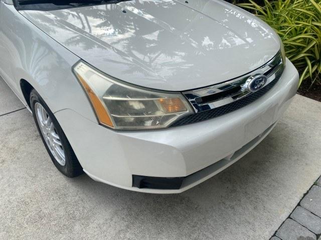 2011 White Suede /Medium Stone Ford Focus SE LOW MILES 36,864 (1FAHP3FN6BW) with an 2.0L 4-Cyl Engine engine, Automatic transmission, located at 4701 North Dixie Hwy, Pompano Beach, FL, 33064, (954) 422-2889, 26.240938, -80.123474 - OUR WEBPAGE FLORIDACARS1.COM HAS OVER 100 PHOTOS AND FREE CARFAX LINK 2011 Ford Focus SE Sedan 4 DR 2.0L I4 F DOHC 16V Gasoline 35 MPG Front Wheel Drive Features ABS Brakes Air Conditioning Alloy Wheels AM/FM Stereo Automatic Transmission Auxiliary Audio Input CD Audio Cloth Seats Cruise Control Ove- Photo#93
