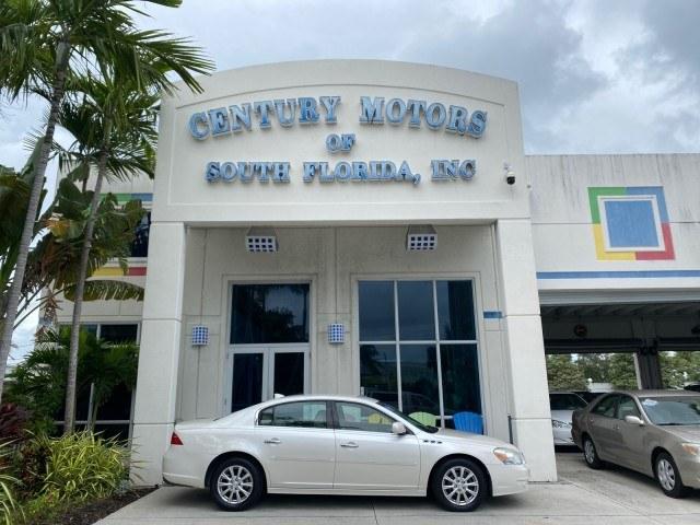 2011 White Diamond Tricoat /Cocoa/Cashmere Buick Lucerne CXL LOW MILES 39,527 (1G4HC5EM2BU) with an 3.9L V6 SFI Flex-Fuel Engine engine, Automatic transmission, located at 4701 North Dixie Hwy, Pompano Beach, FL, 33064, (954) 422-2889, 26.240938, -80.123474 - OUR WEBPAGE FLORIDACARS1.COM HAS OVER 100 PHOTOS AND FREE CARFAX LINK 2011 Buick Lucerne CXL Sedan 4 DR 3.9L V6 F OHV 12V Flex Fuel 27 MPG Front Wheel Drive Features ABS Brakes Air Conditioning Alloy Wheels AM/FM Stereo Automatic Transmission Auxiliary Audio Input Blind Spot Monitor Bluetooth Techno- Photo#0