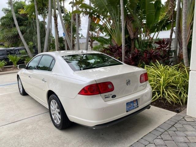 2011 White Diamond Tricoat /Cocoa/Cashmere Buick Lucerne CXL LOW MILES 39,527 (1G4HC5EM2BU) with an 3.9L V6 SFI Flex-Fuel Engine engine, Automatic transmission, located at 4701 North Dixie Hwy, Pompano Beach, FL, 33064, (954) 422-2889, 26.240938, -80.123474 - OUR WEBPAGE FLORIDACARS1.COM HAS OVER 100 PHOTOS AND FREE CARFAX LINK 2011 Buick Lucerne CXL Sedan 4 DR 3.9L V6 F OHV 12V Flex Fuel 27 MPG Front Wheel Drive Features ABS Brakes Air Conditioning Alloy Wheels AM/FM Stereo Automatic Transmission Auxiliary Audio Input Blind Spot Monitor Bluetooth Techno- Photo#5