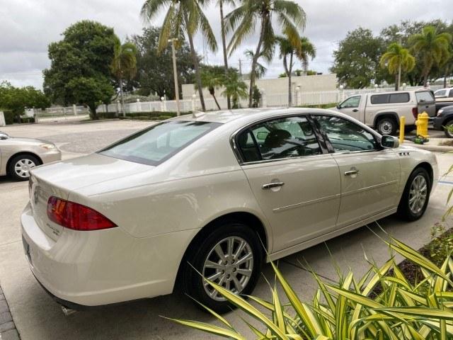 2011 White Diamond Tricoat /Cocoa/Cashmere Buick Lucerne CXL LOW MILES 39,527 (1G4HC5EM2BU) with an 3.9L V6 SFI Flex-Fuel Engine engine, Automatic transmission, located at 4701 North Dixie Hwy, Pompano Beach, FL, 33064, (954) 422-2889, 26.240938, -80.123474 - OUR WEBPAGE FLORIDACARS1.COM HAS OVER 100 PHOTOS AND FREE CARFAX LINK 2011 Buick Lucerne CXL Sedan 4 DR 3.9L V6 F OHV 12V Flex Fuel 27 MPG Front Wheel Drive Features ABS Brakes Air Conditioning Alloy Wheels AM/FM Stereo Automatic Transmission Auxiliary Audio Input Blind Spot Monitor Bluetooth Techno- Photo#7