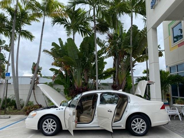 2011 White Diamond Tricoat /Cocoa/Cashmere Buick Lucerne CXL LOW MILES 39,527 (1G4HC5EM2BU) with an 3.9L V6 SFI Flex-Fuel Engine engine, Automatic transmission, located at 4701 North Dixie Hwy, Pompano Beach, FL, 33064, (954) 422-2889, 26.240938, -80.123474 - OUR WEBPAGE FLORIDACARS1.COM HAS OVER 100 PHOTOS AND FREE CARFAX LINK 2011 Buick Lucerne CXL Sedan 4 DR 3.9L V6 F OHV 12V Flex Fuel 27 MPG Front Wheel Drive Features ABS Brakes Air Conditioning Alloy Wheels AM/FM Stereo Automatic Transmission Auxiliary Audio Input Blind Spot Monitor Bluetooth Techno- Photo#8
