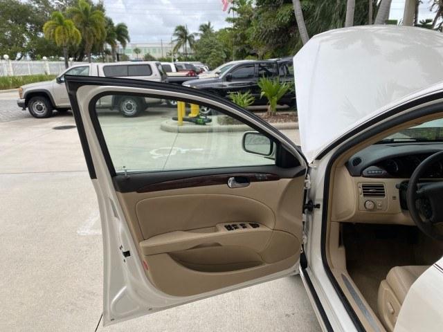 2011 White Diamond Tricoat /Cocoa/Cashmere Buick Lucerne CXL LOW MILES 39,527 (1G4HC5EM2BU) with an 3.9L V6 SFI Flex-Fuel Engine engine, Automatic transmission, located at 4701 North Dixie Hwy, Pompano Beach, FL, 33064, (954) 422-2889, 26.240938, -80.123474 - OUR WEBPAGE FLORIDACARS1.COM HAS OVER 100 PHOTOS AND FREE CARFAX LINK 2011 Buick Lucerne CXL Sedan 4 DR 3.9L V6 F OHV 12V Flex Fuel 27 MPG Front Wheel Drive Features ABS Brakes Air Conditioning Alloy Wheels AM/FM Stereo Automatic Transmission Auxiliary Audio Input Blind Spot Monitor Bluetooth Techno- Photo#9
