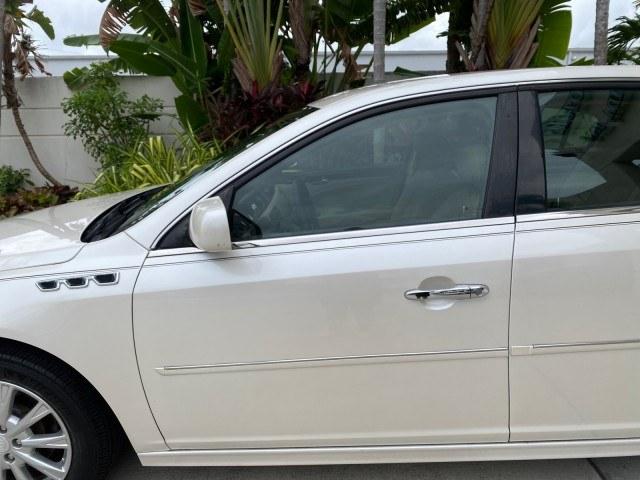2011 White Diamond Tricoat /Cocoa/Cashmere Buick Lucerne CXL LOW MILES 39,527 (1G4HC5EM2BU) with an 3.9L V6 SFI Flex-Fuel Engine engine, Automatic transmission, located at 4701 North Dixie Hwy, Pompano Beach, FL, 33064, (954) 422-2889, 26.240938, -80.123474 - OUR WEBPAGE FLORIDACARS1.COM HAS OVER 100 PHOTOS AND FREE CARFAX LINK 2011 Buick Lucerne CXL Sedan 4 DR 3.9L V6 F OHV 12V Flex Fuel 27 MPG Front Wheel Drive Features ABS Brakes Air Conditioning Alloy Wheels AM/FM Stereo Automatic Transmission Auxiliary Audio Input Blind Spot Monitor Bluetooth Techno- Photo#27
