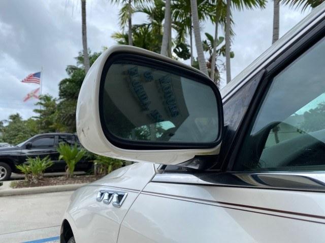 2011 White Diamond Tricoat /Cocoa/Cashmere Buick Lucerne CXL LOW MILES 39,527 (1G4HC5EM2BU) with an 3.9L V6 SFI Flex-Fuel Engine engine, Automatic transmission, located at 4701 North Dixie Hwy, Pompano Beach, FL, 33064, (954) 422-2889, 26.240938, -80.123474 - OUR WEBPAGE FLORIDACARS1.COM HAS OVER 100 PHOTOS AND FREE CARFAX LINK 2011 Buick Lucerne CXL Sedan 4 DR 3.9L V6 F OHV 12V Flex Fuel 27 MPG Front Wheel Drive Features ABS Brakes Air Conditioning Alloy Wheels AM/FM Stereo Automatic Transmission Auxiliary Audio Input Blind Spot Monitor Bluetooth Techno- Photo#29