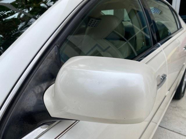 2011 White Diamond Tricoat /Cocoa/Cashmere Buick Lucerne CXL LOW MILES 39,527 (1G4HC5EM2BU) with an 3.9L V6 SFI Flex-Fuel Engine engine, Automatic transmission, located at 4701 North Dixie Hwy, Pompano Beach, FL, 33064, (954) 422-2889, 26.240938, -80.123474 - OUR WEBPAGE FLORIDACARS1.COM HAS OVER 100 PHOTOS AND FREE CARFAX LINK 2011 Buick Lucerne CXL Sedan 4 DR 3.9L V6 F OHV 12V Flex Fuel 27 MPG Front Wheel Drive Features ABS Brakes Air Conditioning Alloy Wheels AM/FM Stereo Automatic Transmission Auxiliary Audio Input Blind Spot Monitor Bluetooth Techno- Photo#30