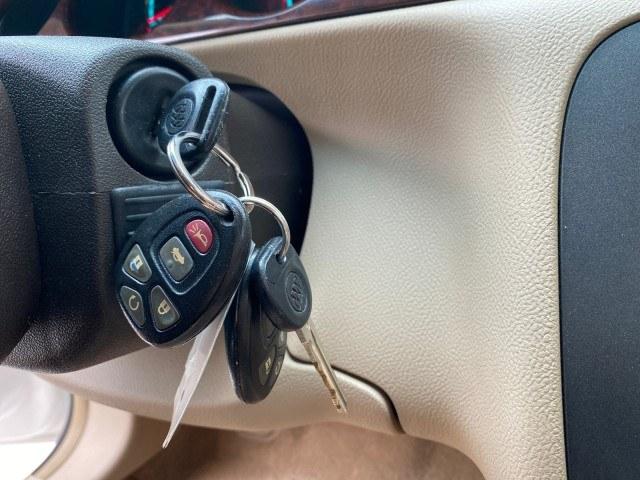 2011 White Diamond Tricoat /Cocoa/Cashmere Buick Lucerne CXL LOW MILES 39,527 (1G4HC5EM2BU) with an 3.9L V6 SFI Flex-Fuel Engine engine, Automatic transmission, located at 4701 North Dixie Hwy, Pompano Beach, FL, 33064, (954) 422-2889, 26.240938, -80.123474 - OUR WEBPAGE FLORIDACARS1.COM HAS OVER 100 PHOTOS AND FREE CARFAX LINK 2011 Buick Lucerne CXL Sedan 4 DR 3.9L V6 F OHV 12V Flex Fuel 27 MPG Front Wheel Drive Features ABS Brakes Air Conditioning Alloy Wheels AM/FM Stereo Automatic Transmission Auxiliary Audio Input Blind Spot Monitor Bluetooth Techno- Photo#43