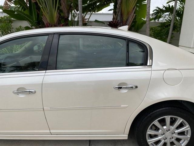 2011 White Diamond Tricoat /Cocoa/Cashmere Buick Lucerne CXL LOW MILES 39,527 (1G4HC5EM2BU) with an 3.9L V6 SFI Flex-Fuel Engine engine, Automatic transmission, located at 4701 North Dixie Hwy, Pompano Beach, FL, 33064, (954) 422-2889, 26.240938, -80.123474 - OUR WEBPAGE FLORIDACARS1.COM HAS OVER 100 PHOTOS AND FREE CARFAX LINK 2011 Buick Lucerne CXL Sedan 4 DR 3.9L V6 F OHV 12V Flex Fuel 27 MPG Front Wheel Drive Features ABS Brakes Air Conditioning Alloy Wheels AM/FM Stereo Automatic Transmission Auxiliary Audio Input Blind Spot Monitor Bluetooth Techno- Photo#53