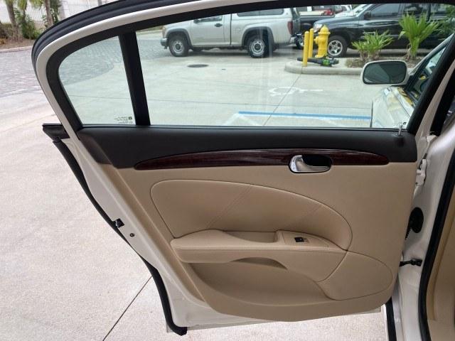 2011 White Diamond Tricoat /Cocoa/Cashmere Buick Lucerne CXL LOW MILES 39,527 (1G4HC5EM2BU) with an 3.9L V6 SFI Flex-Fuel Engine engine, Automatic transmission, located at 4701 North Dixie Hwy, Pompano Beach, FL, 33064, (954) 422-2889, 26.240938, -80.123474 - OUR WEBPAGE FLORIDACARS1.COM HAS OVER 100 PHOTOS AND FREE CARFAX LINK 2011 Buick Lucerne CXL Sedan 4 DR 3.9L V6 F OHV 12V Flex Fuel 27 MPG Front Wheel Drive Features ABS Brakes Air Conditioning Alloy Wheels AM/FM Stereo Automatic Transmission Auxiliary Audio Input Blind Spot Monitor Bluetooth Techno- Photo#55