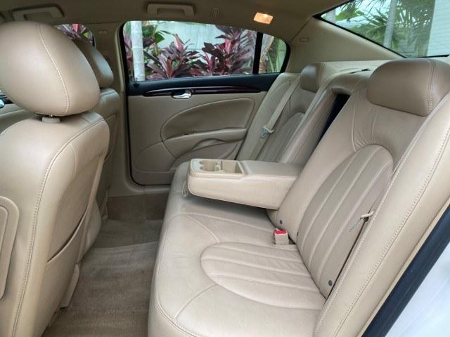 2011 White Diamond Tricoat /Cocoa/Cashmere Buick Lucerne CXL LOW MILES 39,527 (1G4HC5EM2BU) with an 3.9L V6 SFI Flex-Fuel Engine engine, Automatic transmission, located at 4701 North Dixie Hwy, Pompano Beach, FL, 33064, (954) 422-2889, 26.240938, -80.123474 - OUR WEBPAGE FLORIDACARS1.COM HAS OVER 100 PHOTOS AND FREE CARFAX LINK 2011 Buick Lucerne CXL Sedan 4 DR 3.9L V6 F OHV 12V Flex Fuel 27 MPG Front Wheel Drive Features ABS Brakes Air Conditioning Alloy Wheels AM/FM Stereo Automatic Transmission Auxiliary Audio Input Blind Spot Monitor Bluetooth Techno- Photo#56
