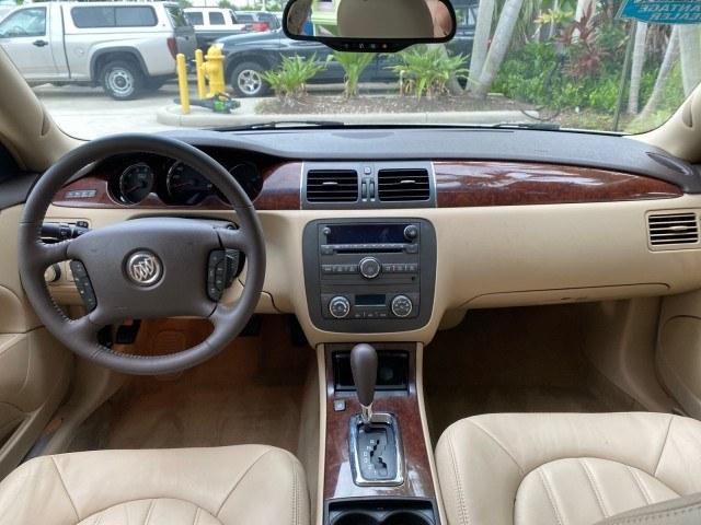 2011 White Diamond Tricoat /Cocoa/Cashmere Buick Lucerne CXL LOW MILES 39,527 (1G4HC5EM2BU) with an 3.9L V6 SFI Flex-Fuel Engine engine, Automatic transmission, located at 4701 North Dixie Hwy, Pompano Beach, FL, 33064, (954) 422-2889, 26.240938, -80.123474 - OUR WEBPAGE FLORIDACARS1.COM HAS OVER 100 PHOTOS AND FREE CARFAX LINK 2011 Buick Lucerne CXL Sedan 4 DR 3.9L V6 F OHV 12V Flex Fuel 27 MPG Front Wheel Drive Features ABS Brakes Air Conditioning Alloy Wheels AM/FM Stereo Automatic Transmission Auxiliary Audio Input Blind Spot Monitor Bluetooth Techno- Photo#58