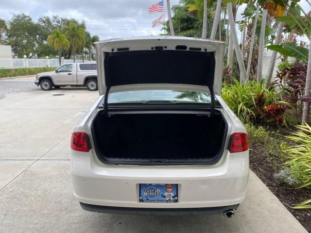 2011 White Diamond Tricoat /Cocoa/Cashmere Buick Lucerne CXL LOW MILES 39,527 (1G4HC5EM2BU) with an 3.9L V6 SFI Flex-Fuel Engine engine, Automatic transmission, located at 4701 North Dixie Hwy, Pompano Beach, FL, 33064, (954) 422-2889, 26.240938, -80.123474 - OUR WEBPAGE FLORIDACARS1.COM HAS OVER 100 PHOTOS AND FREE CARFAX LINK 2011 Buick Lucerne CXL Sedan 4 DR 3.9L V6 F OHV 12V Flex Fuel 27 MPG Front Wheel Drive Features ABS Brakes Air Conditioning Alloy Wheels AM/FM Stereo Automatic Transmission Auxiliary Audio Input Blind Spot Monitor Bluetooth Techno- Photo#67