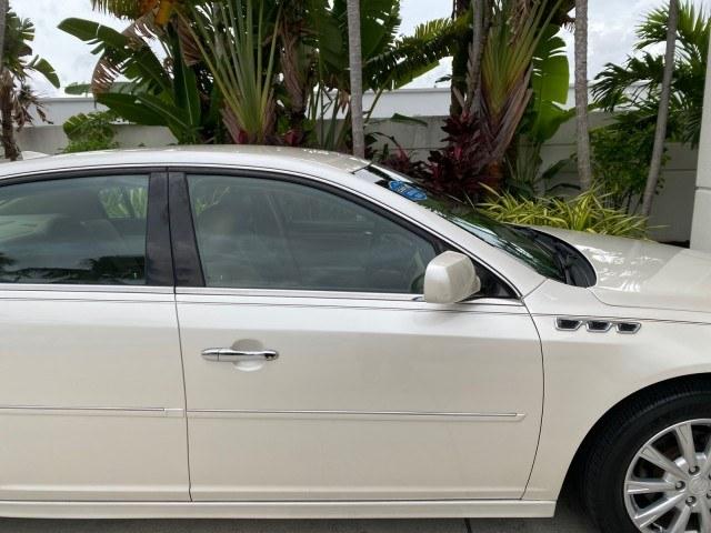 2011 White Diamond Tricoat /Cocoa/Cashmere Buick Lucerne CXL LOW MILES 39,527 (1G4HC5EM2BU) with an 3.9L V6 SFI Flex-Fuel Engine engine, Automatic transmission, located at 4701 North Dixie Hwy, Pompano Beach, FL, 33064, (954) 422-2889, 26.240938, -80.123474 - OUR WEBPAGE FLORIDACARS1.COM HAS OVER 100 PHOTOS AND FREE CARFAX LINK 2011 Buick Lucerne CXL Sedan 4 DR 3.9L V6 F OHV 12V Flex Fuel 27 MPG Front Wheel Drive Features ABS Brakes Air Conditioning Alloy Wheels AM/FM Stereo Automatic Transmission Auxiliary Audio Input Blind Spot Monitor Bluetooth Techno- Photo#72