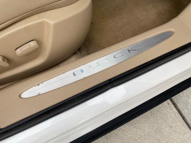 2011 White Diamond Tricoat /Cocoa/Cashmere Buick Lucerne CXL LOW MILES 39,527 (1G4HC5EM2BU) with an 3.9L V6 SFI Flex-Fuel Engine engine, Automatic transmission, located at 4701 North Dixie Hwy, Pompano Beach, FL, 33064, (954) 422-2889, 26.240938, -80.123474 - OUR WEBPAGE FLORIDACARS1.COM HAS OVER 100 PHOTOS AND FREE CARFAX LINK 2011 Buick Lucerne CXL Sedan 4 DR 3.9L V6 F OHV 12V Flex Fuel 27 MPG Front Wheel Drive Features ABS Brakes Air Conditioning Alloy Wheels AM/FM Stereo Automatic Transmission Auxiliary Audio Input Blind Spot Monitor Bluetooth Techno- Photo#77